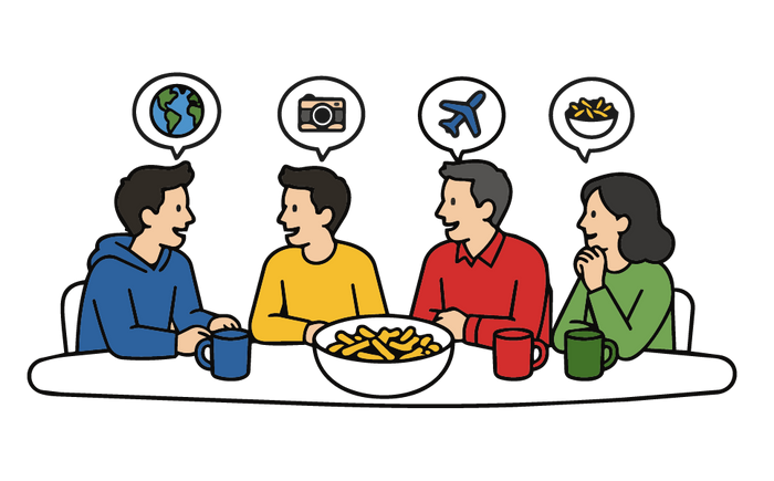 Family gathered around a table sharing snacks and ideas